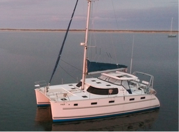 Antares catamaran at anchor